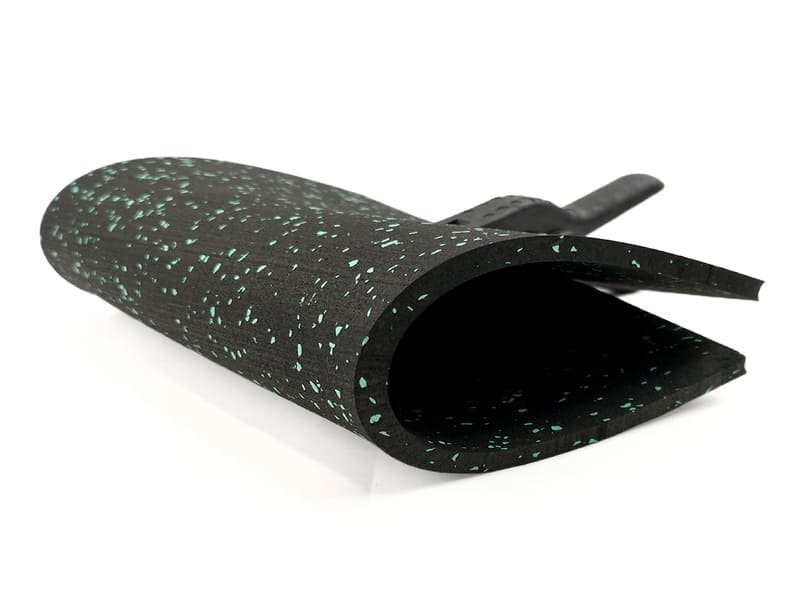 Rolled rubber flooring being installed by a professional team